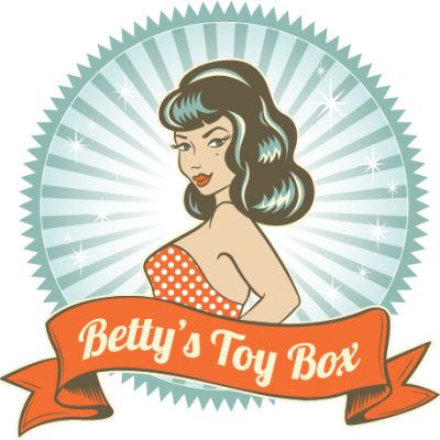 Logo for Bettys Toy Box shows pin-up style cartoon woman behind orange ribbon banner that reads Betty's Toy Box on blue starburst background