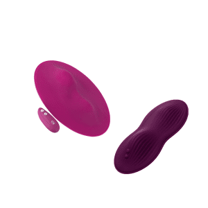 two oval shaped pink pads with vibration bumps along the middle