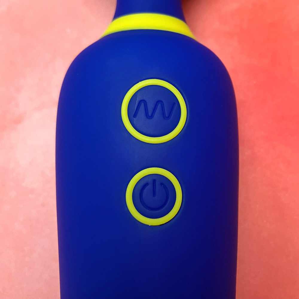 up-close photograph of vibrators power and vibration buttons