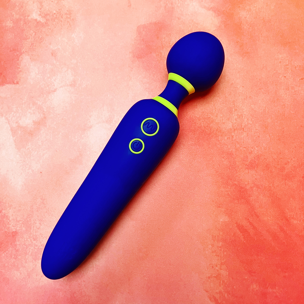photograph of royal blue wand vibrator on peach background 